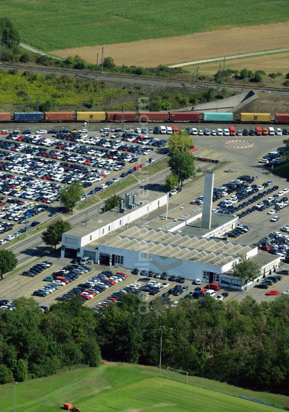 Aerial image Illingen - Building complex and grounds of the logistics center Mosolf Horst GmbH & Co. KG on Wilhelmstrasse in Illingen in the state Baden-Wuerttemberg