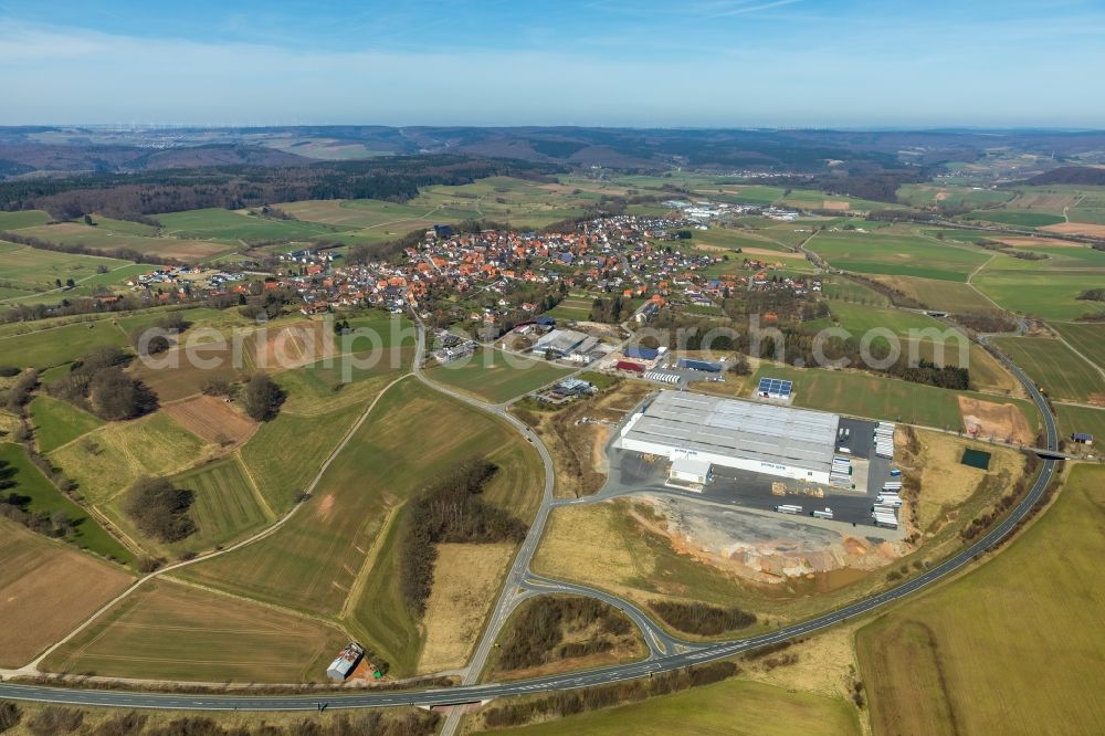 Aerial photograph Diemelstadt - Building complex and grounds of the logistics center of Pappenverarbeitungs-Gesellschaft mbH on Laubacher Weg in Diemelstadt in the state Hesse, Germany