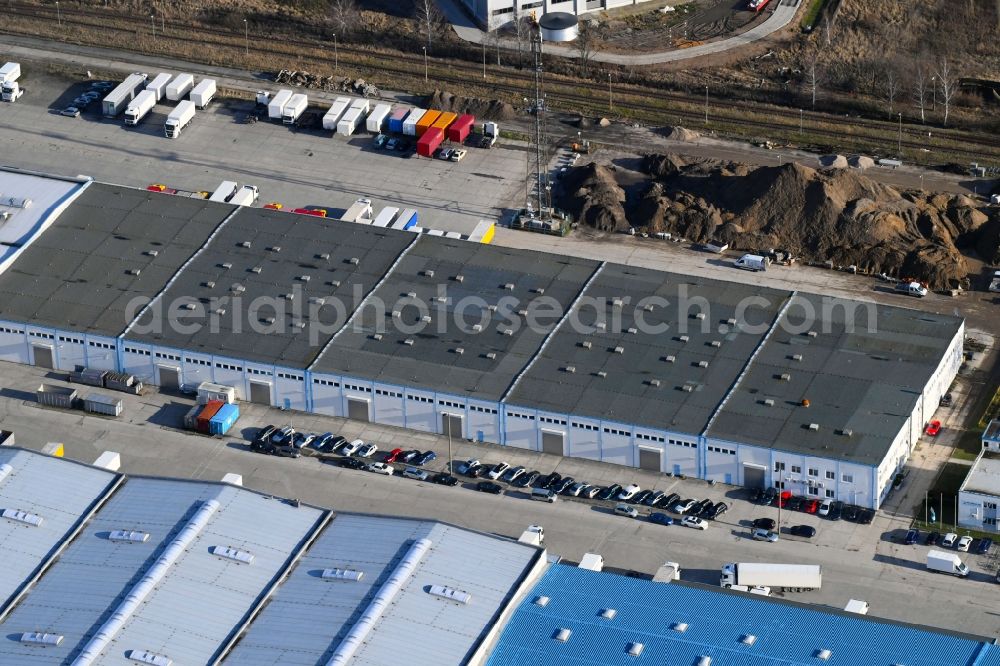 Aerial photograph Hoppegarten - Building complex and grounds of the logistics center of Park Property GmbH & Co.KG in of Industriestrasse in Hoppegarten in the state Brandenburg, Germany