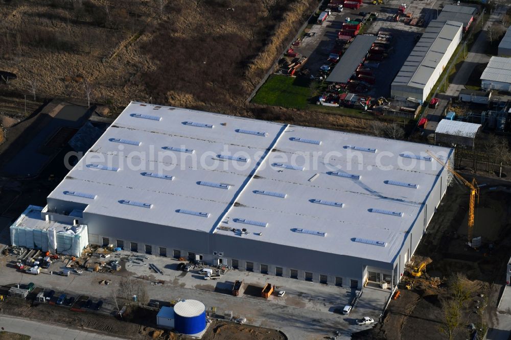 Aerial photograph Hoppegarten - Building complex and grounds of the logistics center of Rhenus Home Delivery GmbH in of Industriestrasse in Hoppegarten in the state Brandenburg, Germany