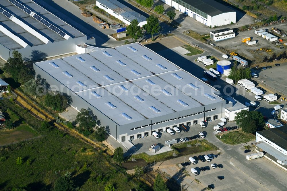 Hoppegarten from above - Building complex and grounds of the logistics center of Rhenus Home Delivery GmbH in of Industriestrasse in Hoppegarten in the state Brandenburg, Germany