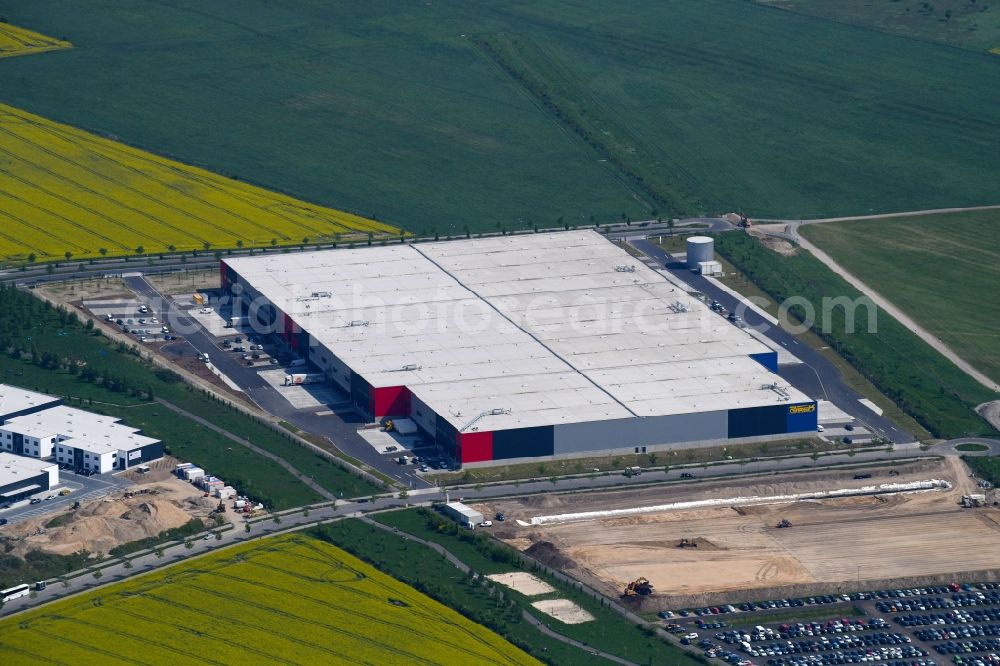 Aerial image Berlin - Building complex and grounds of the logistics center of Rieck Holding GmbH & Co. KG on Alexanof-Meissner-Strasse in Berlin, Germany