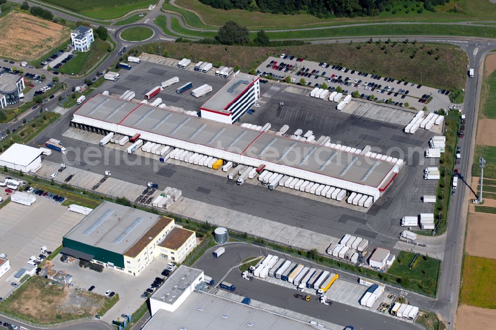 Ilsfeld from above - Building complex and grounds of the logistics center of Schenker Deutschland AG at the Robert-Kohlhammer-Strasse in Ilsfeld in the state Baden-Wurttemberg, Germany