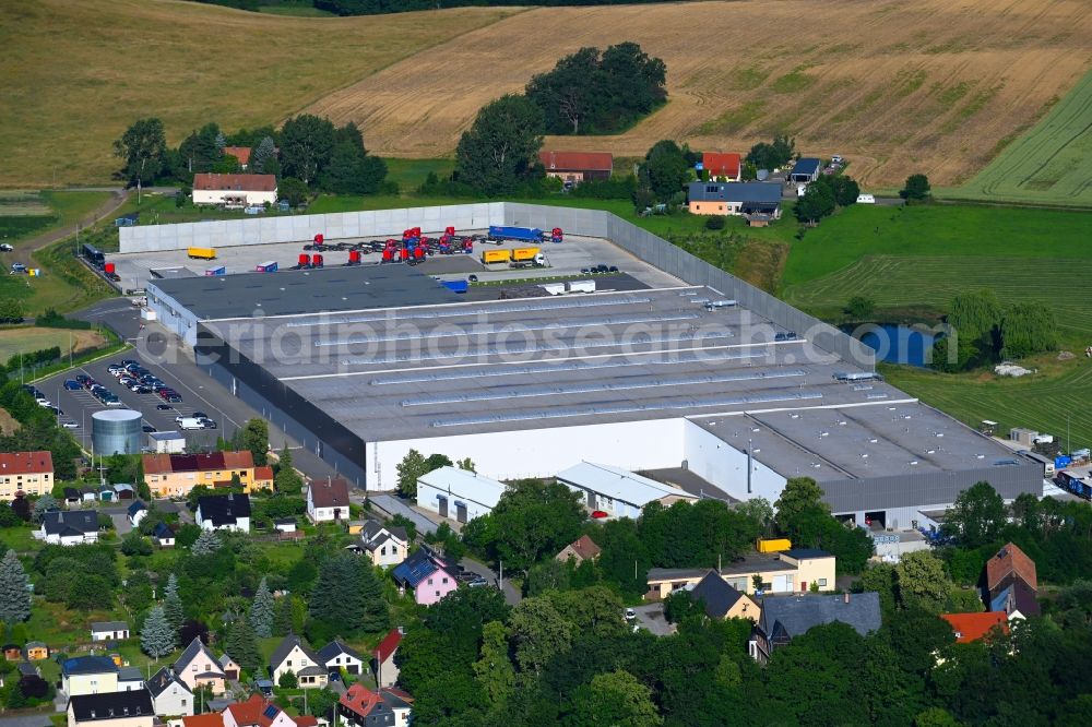 Schönfels from above - Building complex and grounds of the logistics center of Weck+Poller Holding GmbH in Schoenfels in the state Saxony, Germany