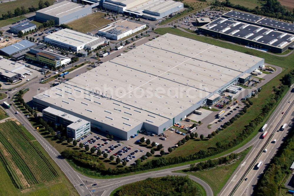 Neuenstadt am Kocher from the bird's eye view: Building complex and grounds of the logistics center in the Wilhelm-Maybach-Strasse in Neuenstadt am Kocher in the state Baden-Wurttemberg, Germany