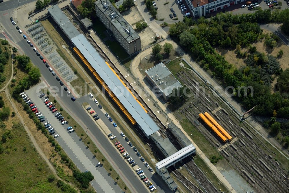 Aerial image Berlin - Building complex and rail tracks of the U-Bahn station Hoenow in the Hellersdorf part of Berlin in Germany. The station is the Eastern most station of the U5 line of the Berlin underground system. It consists of the actual station, several outbuildings and parking lots as well as the large holding track facilities