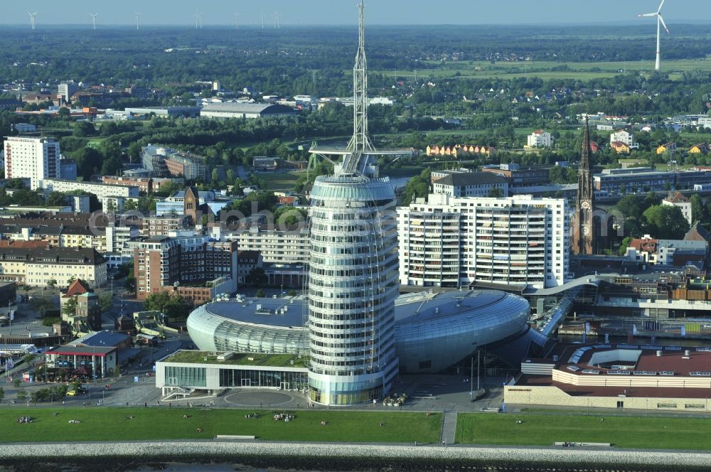 Bremerhaven from above - The high-rise building complex of Sail City Hotel and the Climate House Bremerhaven on the riverside of the river Weser