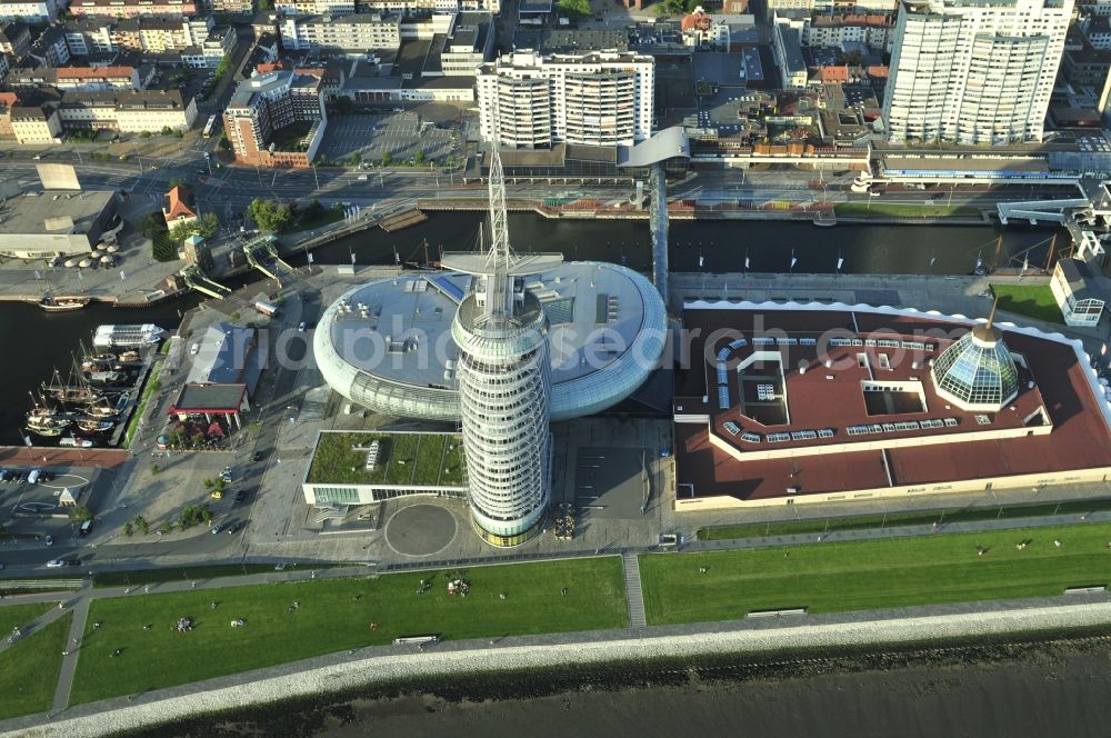 Bremerhaven from above - The high-rise building complex of Sail City Hotel and the Climate House Bremerhaven on the riverside of the river Weser