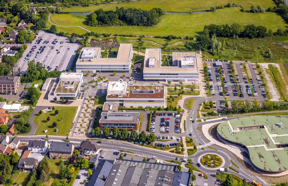 Aerial photograph Lippstadt - Building complex of the university Hochschule Hamm-Lippstadt overlooking the construction site for the Digital Innovation Campus at the Campus Lippstadt on Dr.-Arnold-Hueck-Strasse in Lippstadt in the state North Rhine-Westphalia, Germany