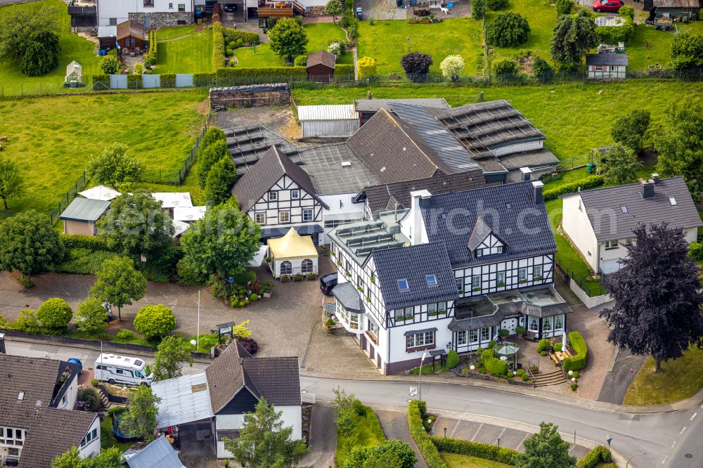 Arnsberg from above - Complex of the hotel building and the restaurant Gasthof Hoffmann in the Mescheder street in the district Rumbeck in Arnsberg at Sauerland in the state North Rhine-Westphalia