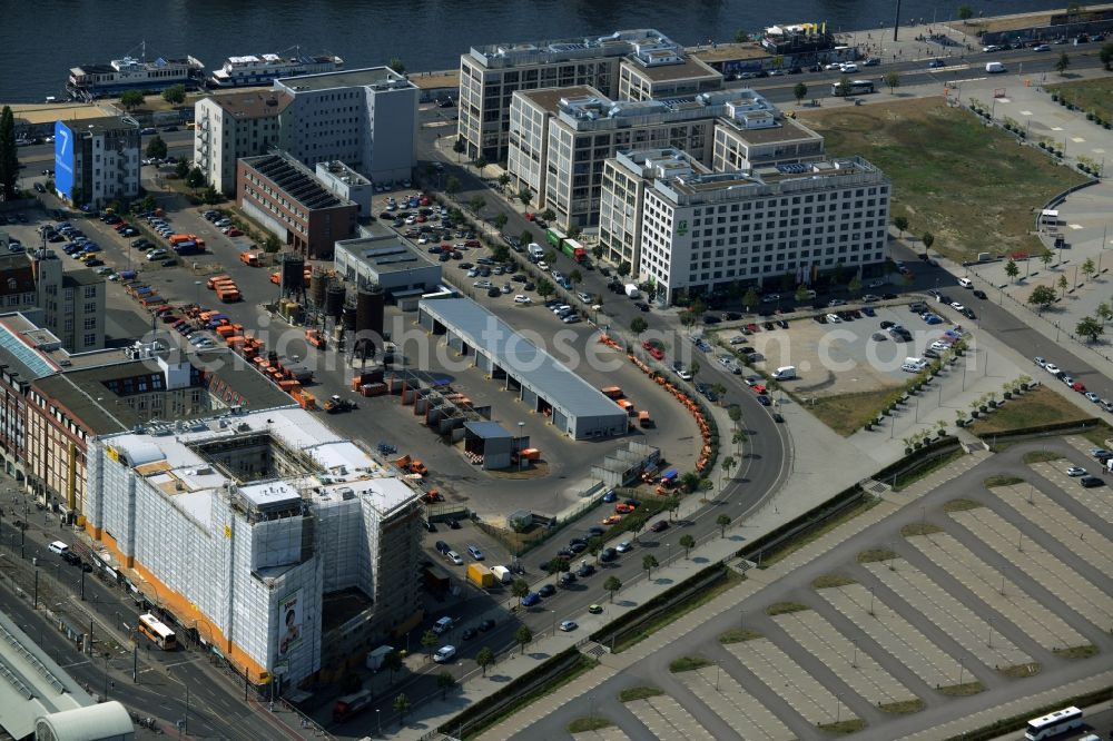 Berlin from above - Complex of the hotel building Holiday Inn Berlin - City East Side and BSR compound on the Spree riverbank in the district of Friedrichshain-Kreuzberg in Berlin in Germany