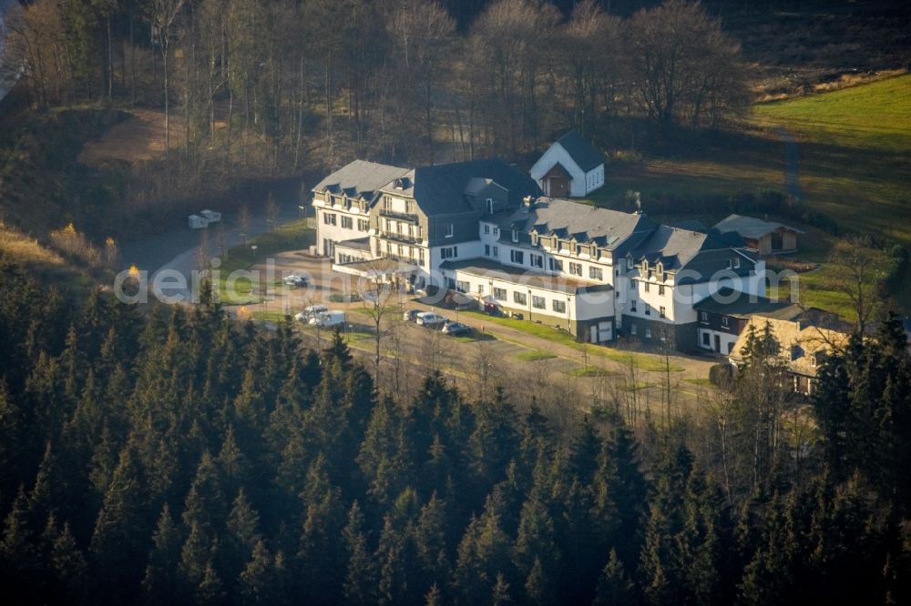 Schmallenberg from the bird's eye view: Complex of the hotel building Hotel Rimberg on Rimberg in Schmallenberg at Sauerland in the state North Rhine-Westphalia, Germany