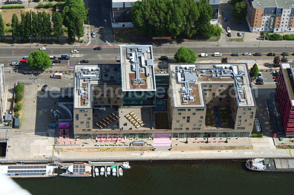 Berlin from above - Complex of the hotel building Hotel nhow on Stralauer Allee in the district Friedrichshain in Berlin, Germany