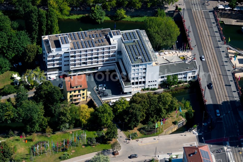 Heilbronn from above - Complex of the hotel building of the Insel-Hotel on the course of the river Neckar at the Willy - Mayer - Bruecke in Heilbronn in the state Baden-Wurttemberg, Germany