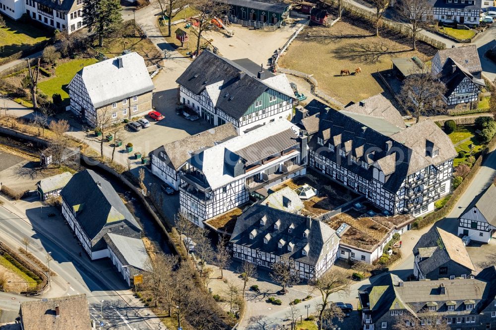 Oberkirchen from above - Complex of the hotel building Landhotel Gasthof Schuette in Oberkirchen at Sauerland in the state North Rhine-Westphalia, Germany