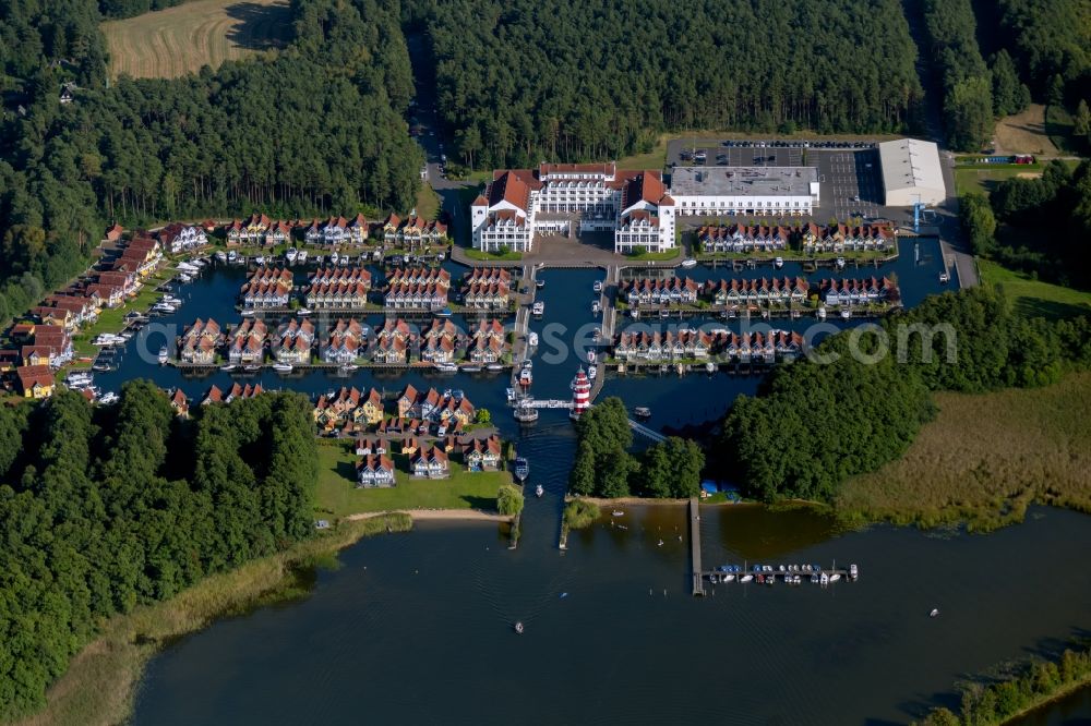 Aerial image Rheinsberg - Building complex of the hotel complex Maritim Hafenhotel Rheinsberg in Rheinsberg on the bank of the Rheinsberg lake in the state of Brandenburg, Germany