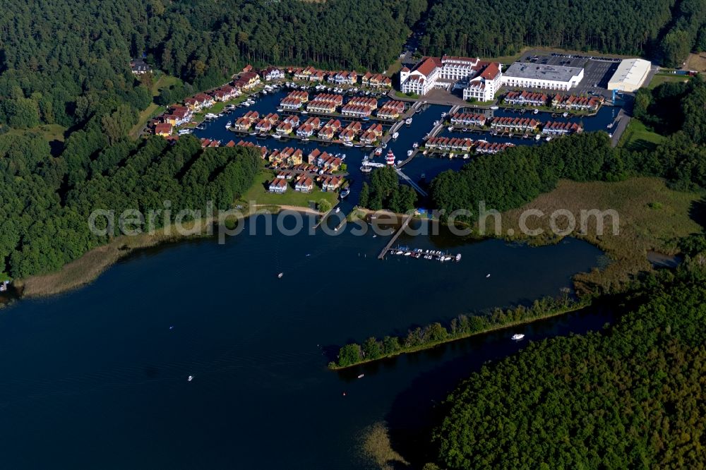 Aerial photograph Rheinsberg - Building complex of the hotel complex Maritim Hafenhotel Rheinsberg in Rheinsberg on the bank of the Rheinsberg lake in the state of Brandenburg, Germany