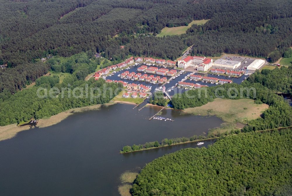 Aerial photograph Rheinsberg - Building complex of the hotel complex Maritim Hafenhotel Rheinsberg in Rheinsberg on the bank of the Rheinsberg lake in the state of Brandenburg, Germany