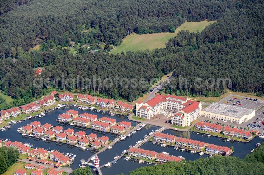 Rheinsberg from above - Building complex of the hotel complex Maritim Hafenhotel Rheinsberg in Rheinsberg on the bank of the Rheinsberg lake in the state of Brandenburg, Germany