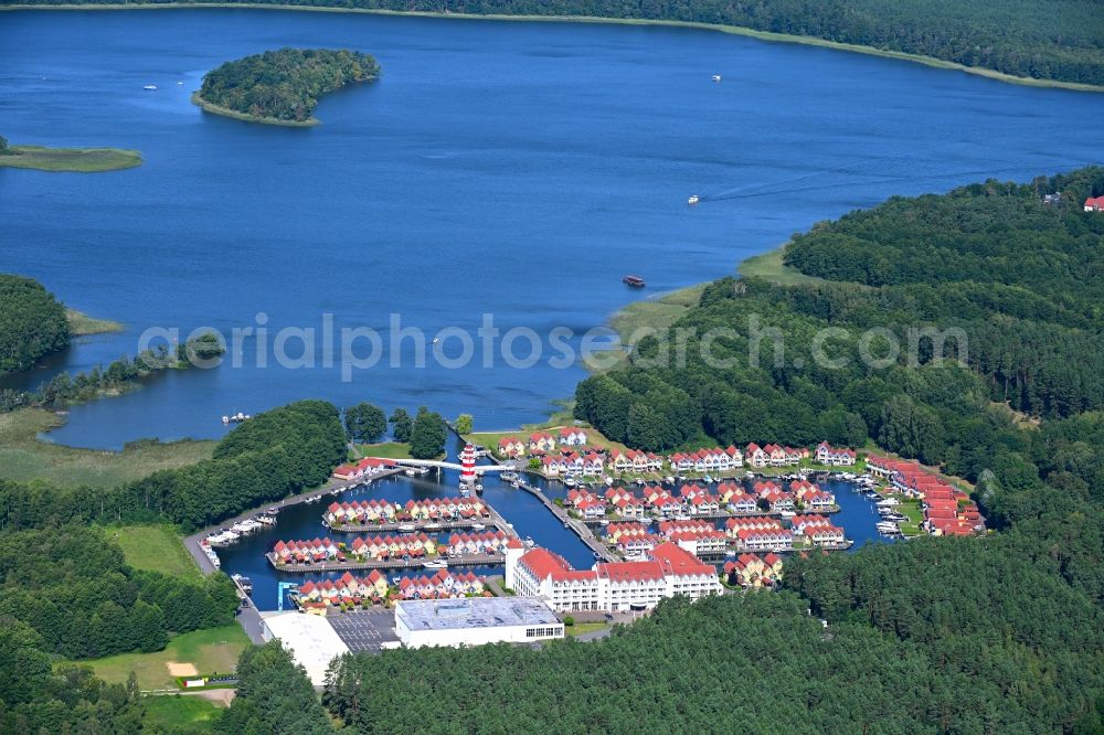 Aerial image Rheinsberg - Building complex of the hotel complex Maritim Hafenhotel Rheinsberg in Rheinsberg on the bank of the Rheinsberg lake in the state of Brandenburg, Germany