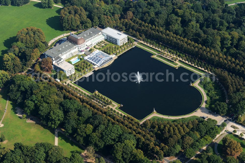 Bremen from above - Complex of the hotel building Park Hotel with the artificial lake Holler See framed with trees in Bremen in Germany