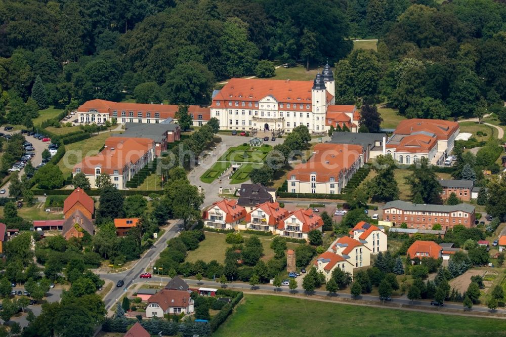 Göhren-Lebbin from the bird's eye view: Complex of the hotel building Schlosshotel Fleesensee in Goehren-Lebbin in the state Mecklenburg - Western Pomerania