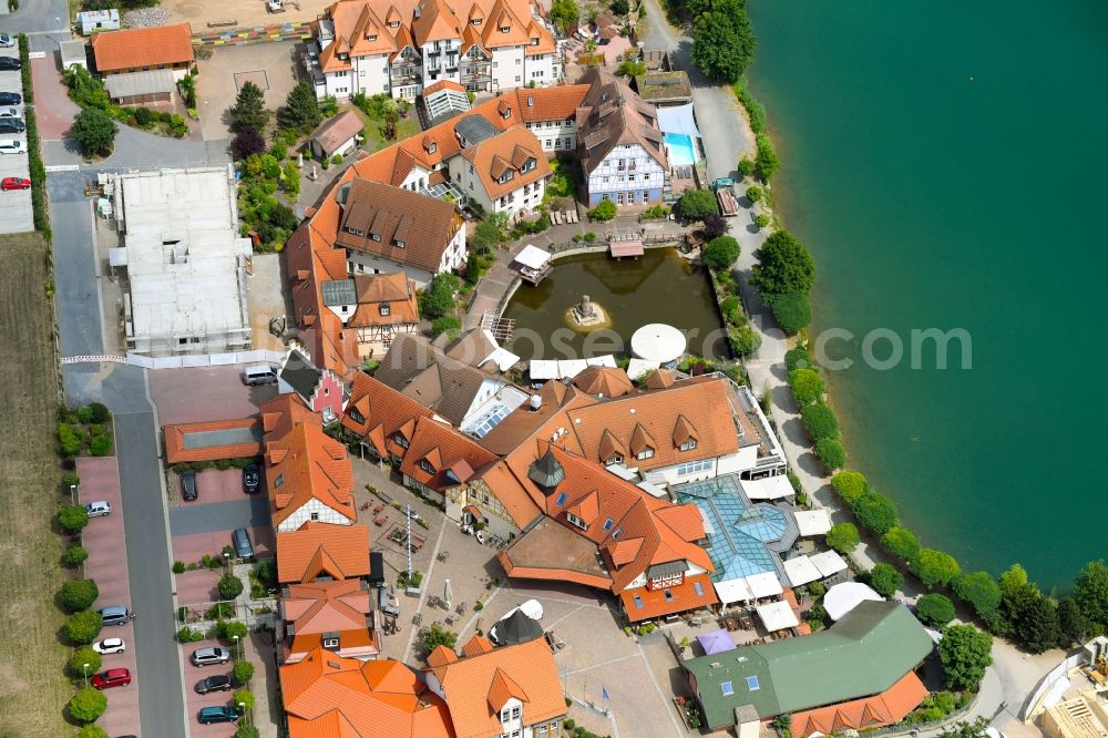 Aerial image Niedernberg - Complex of the hotel building Seehotel on Badesee in Niedernberg in the state Bavaria, Germany