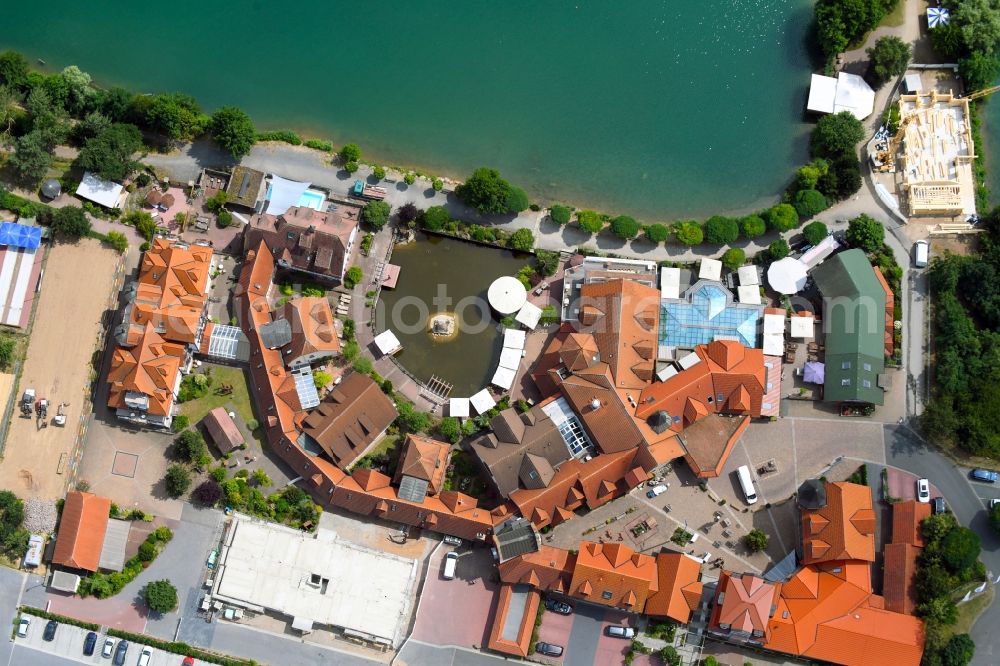 Niedernberg from the bird's eye view: Complex of the hotel building Seehotel on Badesee in Niedernberg in the state Bavaria, Germany