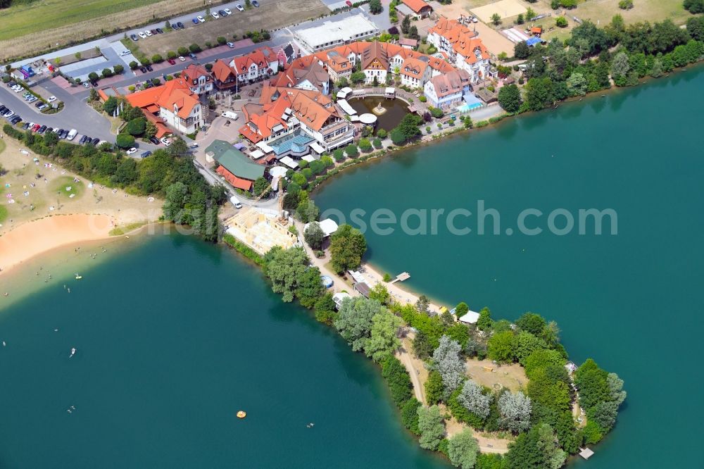 Aerial image Niedernberg - Complex of the hotel building Seehotel on Badesee in Niedernberg in the state Bavaria, Germany