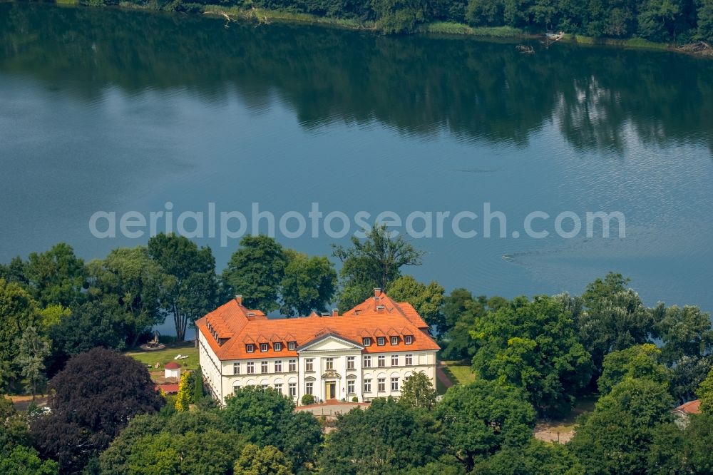 Aerial image Schorssow - Complex of the hotel building Seeschloss Schorssow at Haussee in Schorssow in the state Mecklenburg - Western Pomerania