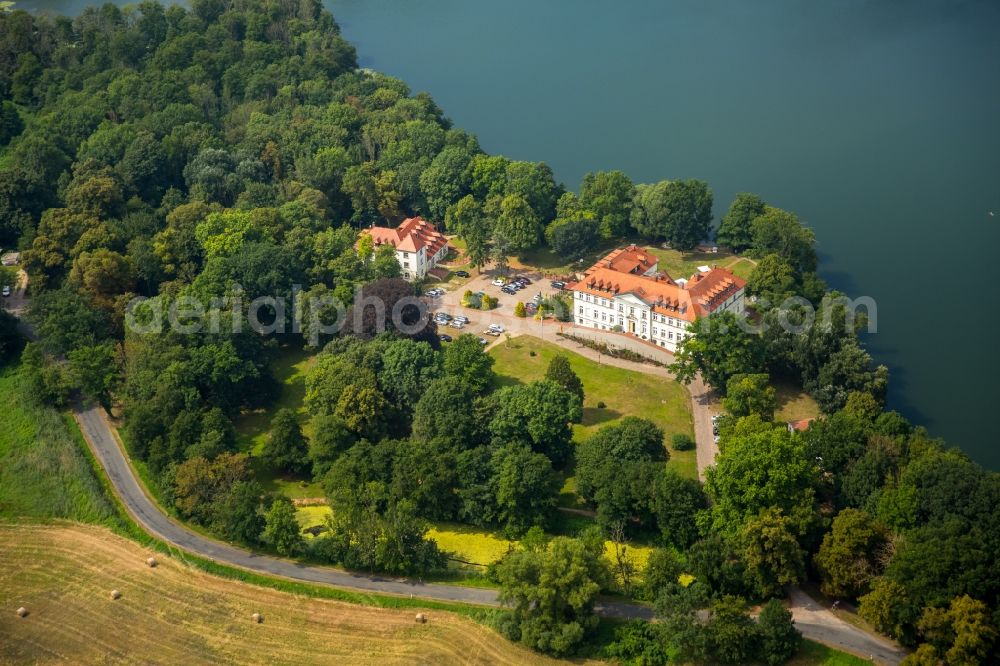 Aerial image Schorssow - Complex of the hotel building Seeschloss Schorssow at Haussee in Schorssow in the state Mecklenburg - Western Pomerania