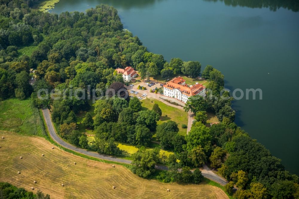 Aerial photograph Schorssow - Complex of the hotel building Seeschloss Schorssow at Haussee in Schorssow in the state Mecklenburg - Western Pomerania