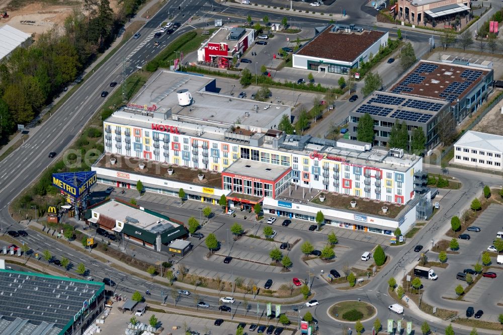 Brunnthal from the bird's eye view: Building complex of the hotel complex Stay2Munich and the Kopernikusstrasse in Brunnthal in the state Bavaria, Germany