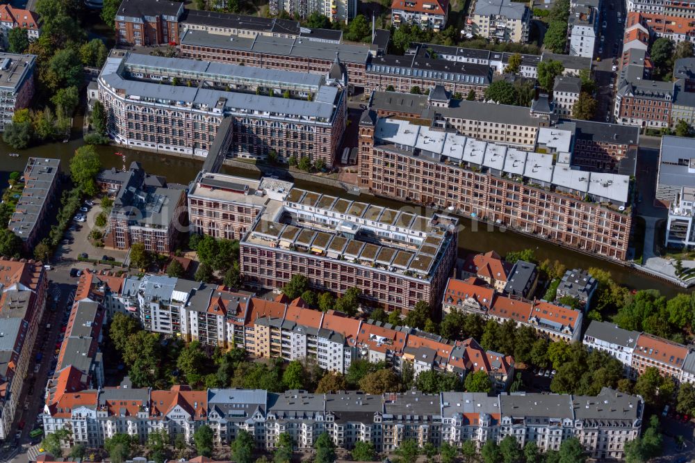 Aerial photograph Leipzig - Complex of the hotel building TRINOM Business Apartments, Elster Lofts in the office and commercial building district along the course of the Weisse Elster river on Nonnenstrasse in the district Plagwitz in Leipzig in the state Saxony