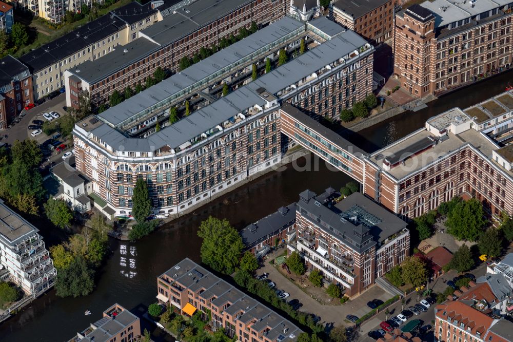 Leipzig from above - Complex of the hotel building TRINOM Business Apartments, Elster Lofts in the office and commercial building district along the course of the Weisse Elster river on Nonnenstrasse in the district Plagwitz in Leipzig in the state Saxony