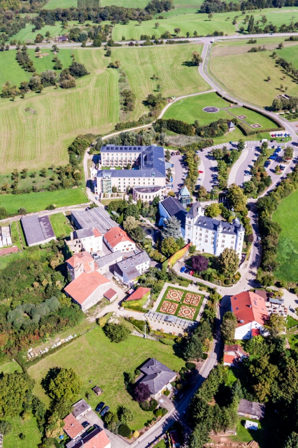 Perl from above - Complex of the hotel building Victor's Residenz-Hotel Schloss Berg and Niederburg Nennig in Perl in the state Saarland, Germany