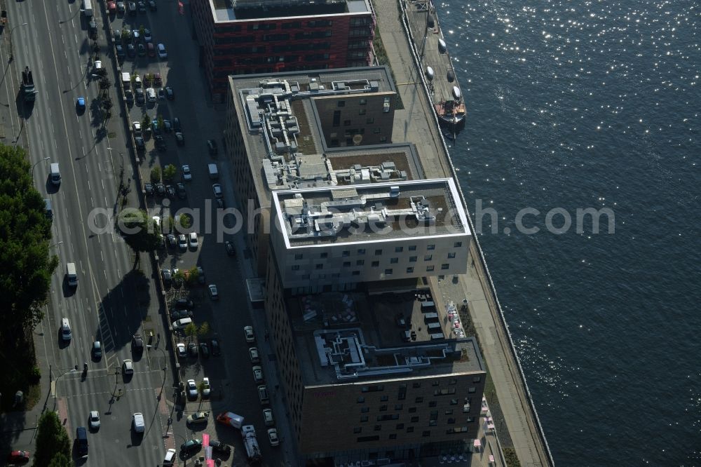 Berlin from above - Complex of the hotel building nhow Berlin on the riverbank of the Spree in the Friedrichshain part of Berlin in Germany