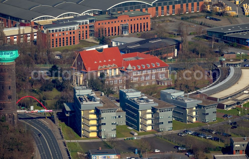 Oberhausen from the bird's eye view: Building complex of the Institute of Technology Center TZU Environmental Management GmbH in Oberhausen in North Rhine-Westphalia. In the background, the production facilities of packaging service provider Deufol SE