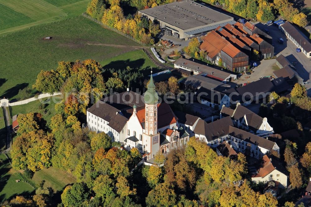 Aerial image Andechs - Building complex of the monastery Andechs Klostergasthof in the state Bavaria. The pilgrimage to the holy mountain is the oldest pilgrimage in Bavaria and one of the most important pilgrimage sites in Bavaria. The Klosterschaenke Monastery Brewery with the beer garden on the terrace Braeustueberl maintains the tradition of pilgrimage restaurant