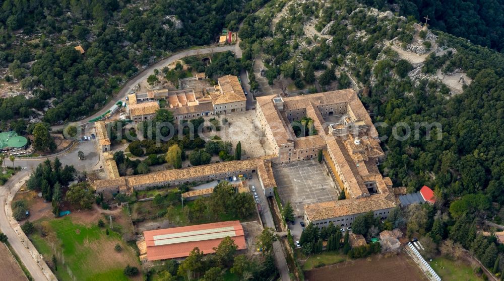 Aerial image Escorca - Complex of buildings of the monastery Santuari de Lluc in Escorca in Balearic island of Mallorca, Spain