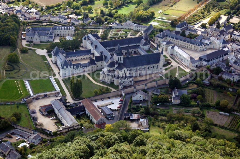 Aerial photograph Fontevraud l'Abbaye - Complex of buildings of the monastery Fontevraud in Fontevraud l'Abbaye in Pays de la Loire, France. The Abbaye Royale de Fontevraud, a royal abbey, was a mixed monastery founded around the year 1100. It is the largest monastic building in Europe