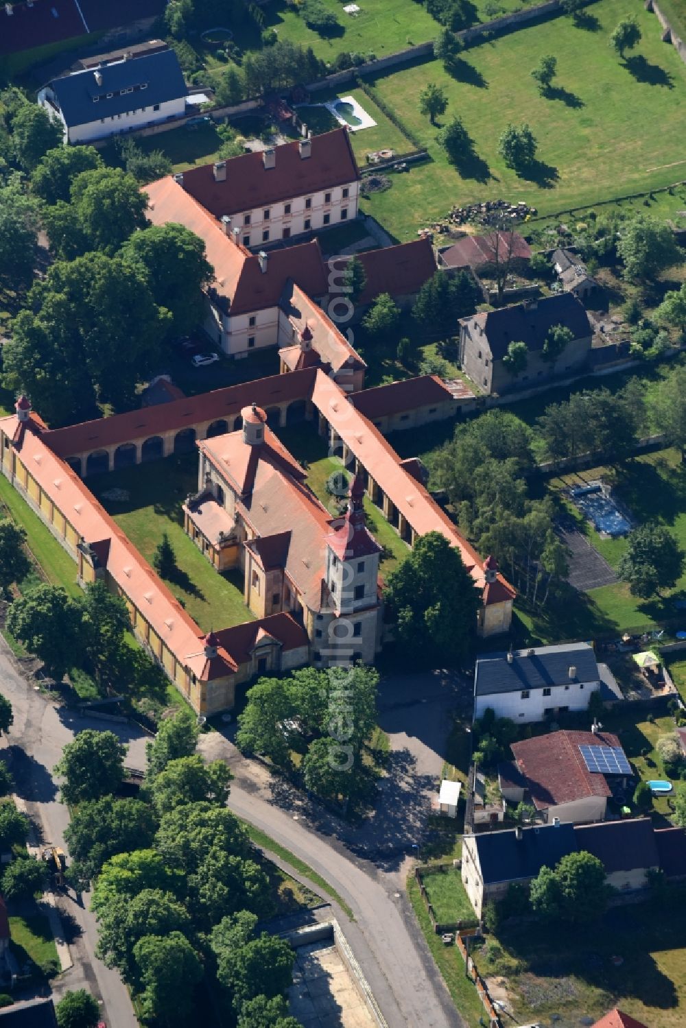 Marianske Radcice from above - Complex of buildings of the monastery Kostel Panny Marie Bolestne in Marianske Radcice in Most, Czech Republic