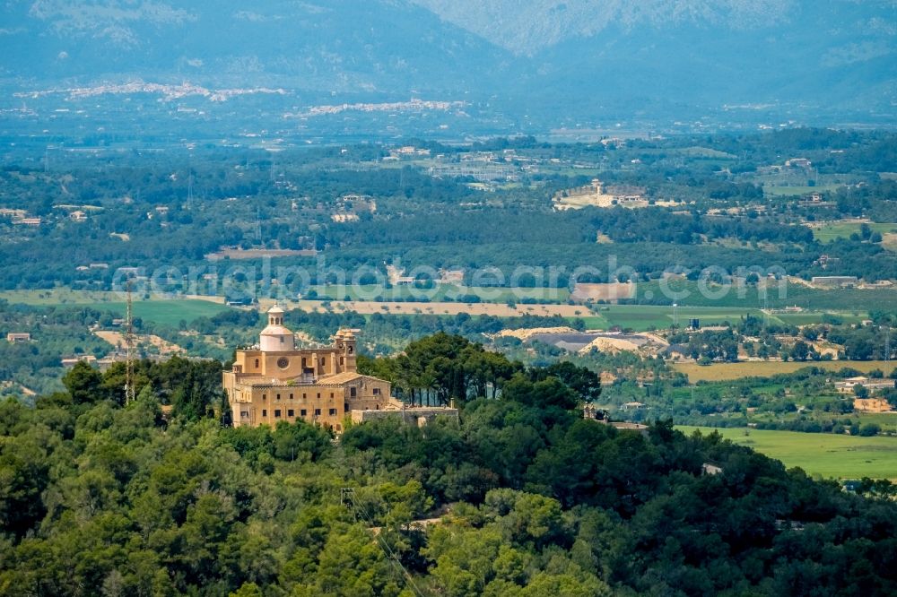 Petra from the bird's eye view: Complex of buildings of the monastery Santuari de la Mare de Deu de Bonany with the shrine of the same name La Mare de Deu de Bonany in Petra in Balearic island of Mallorca, Spain