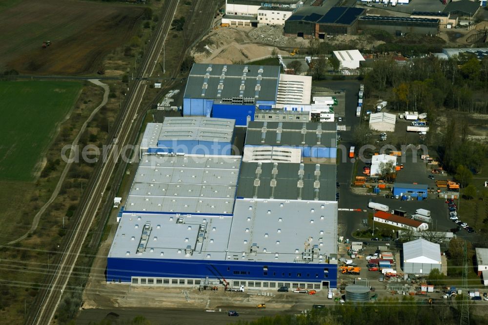 Velten from the bird's eye view: Building complex and distribution center on the site ASSI TecLog AG and of Rhenus SE & Co. KG in Velten in the state Brandenburg, Germany