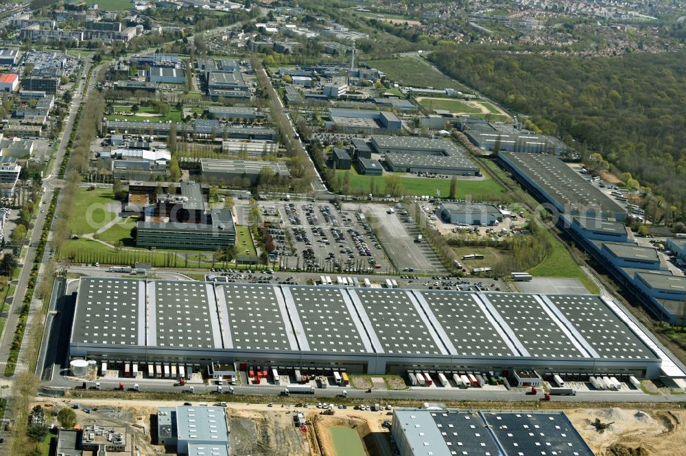 Aerial photograph Trappes - Building complex and distribution center on the site Auchan on Rue Roger Hennequin in Trappes in Ile-de-France, France