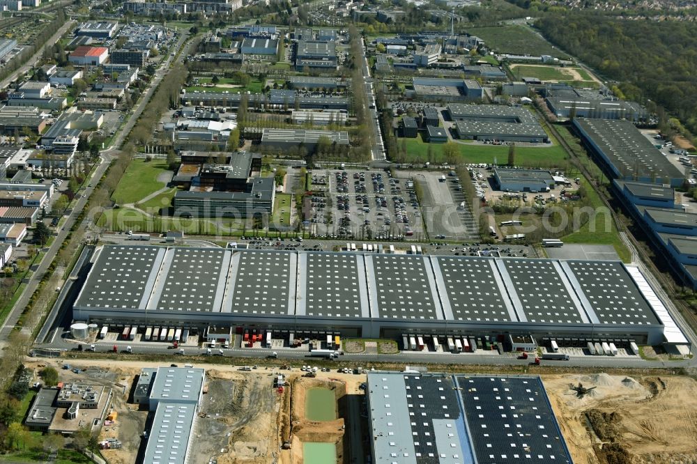 Trappes from above - Building complex and distribution center on the site Auchan on Rue Roger Hennequin in Trappes in Ile-de-France, France