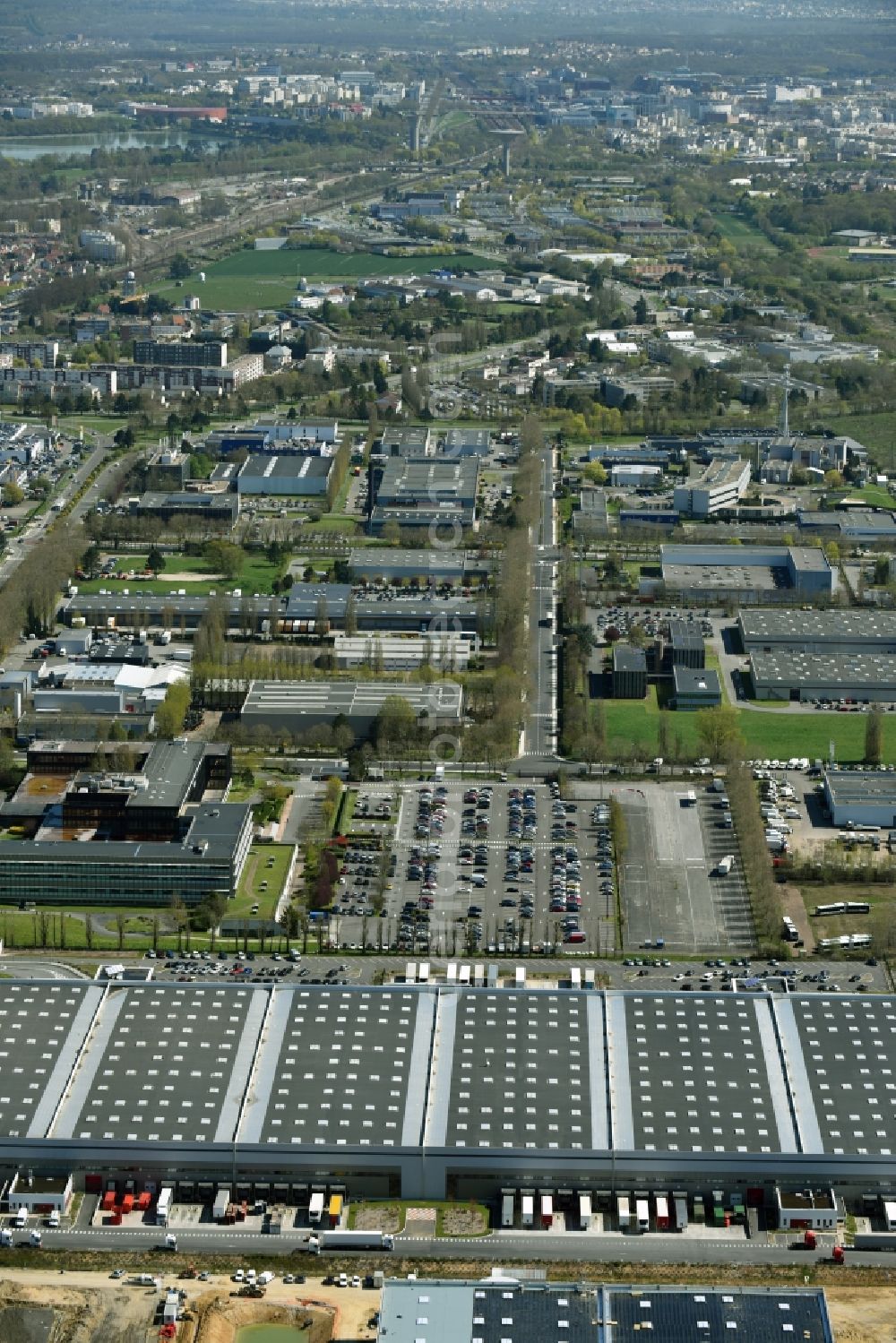 Aerial image Trappes - Building complex and distribution center on the site Auchan on Rue Roger Hennequin in Trappes in Ile-de-France, France