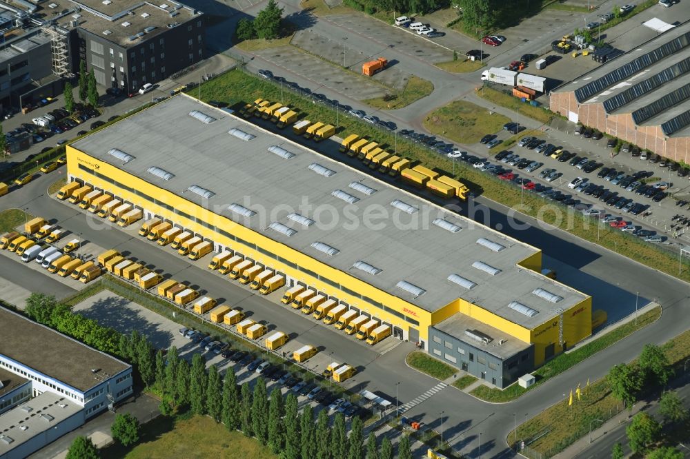 Berlin from above - Building complex and distribution center on the site Deutsche Post - DHL Mech.ZB BRITZ on Gradestrasse in the district Bezirk Neukoelln in Berlin, Germany