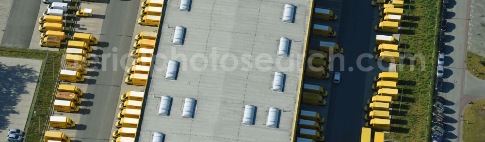 Aerial image Berlin - Building complex and distribution center on the site Deutsche Post - DHL Mech.ZB BRITZ on Gradestrasse in the district Bezirk Neukoelln in Berlin, Germany