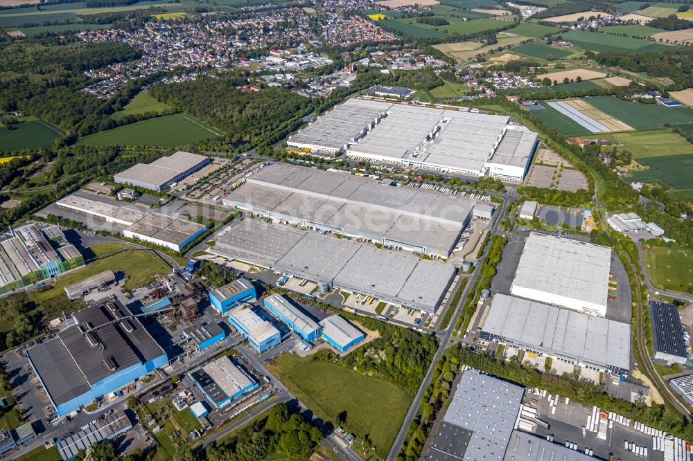 Unna from the bird's eye view: Building complex and distribution center on the site of DHL Solutions GmbH on Giesserstrasse in the district Alte Heide in Unna in the state North Rhine-Westphalia, Germany